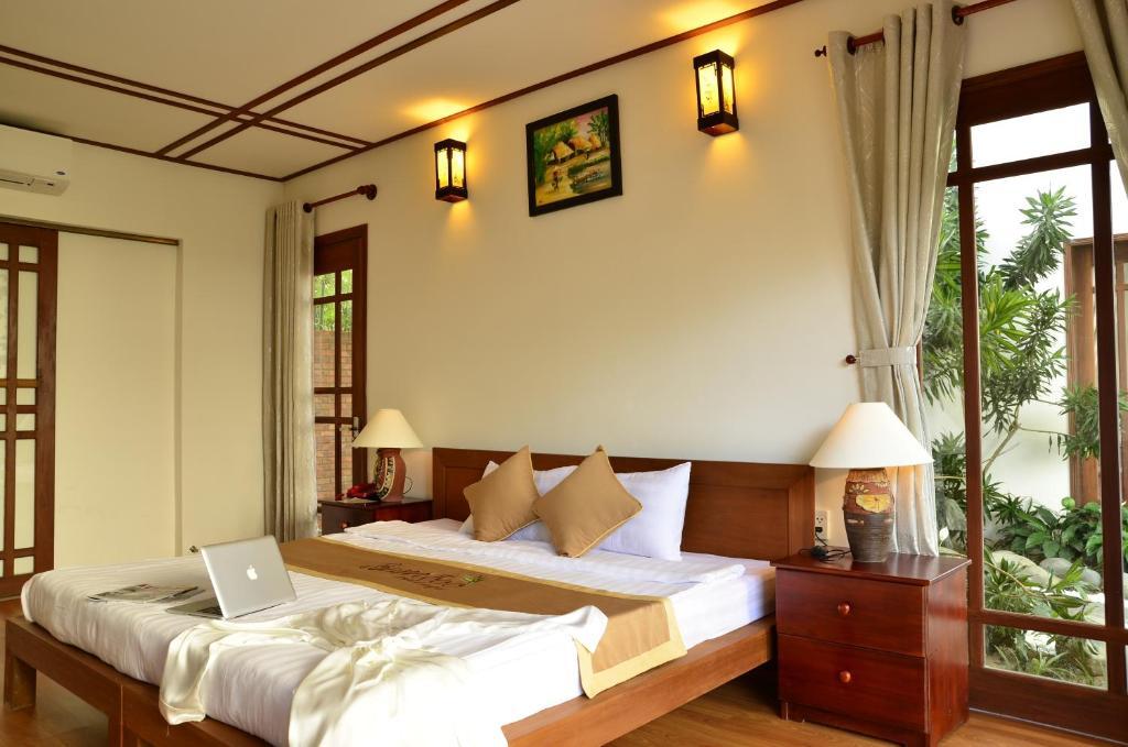 Riverside Bamboo Resort Hoi An Pokoj fotografie